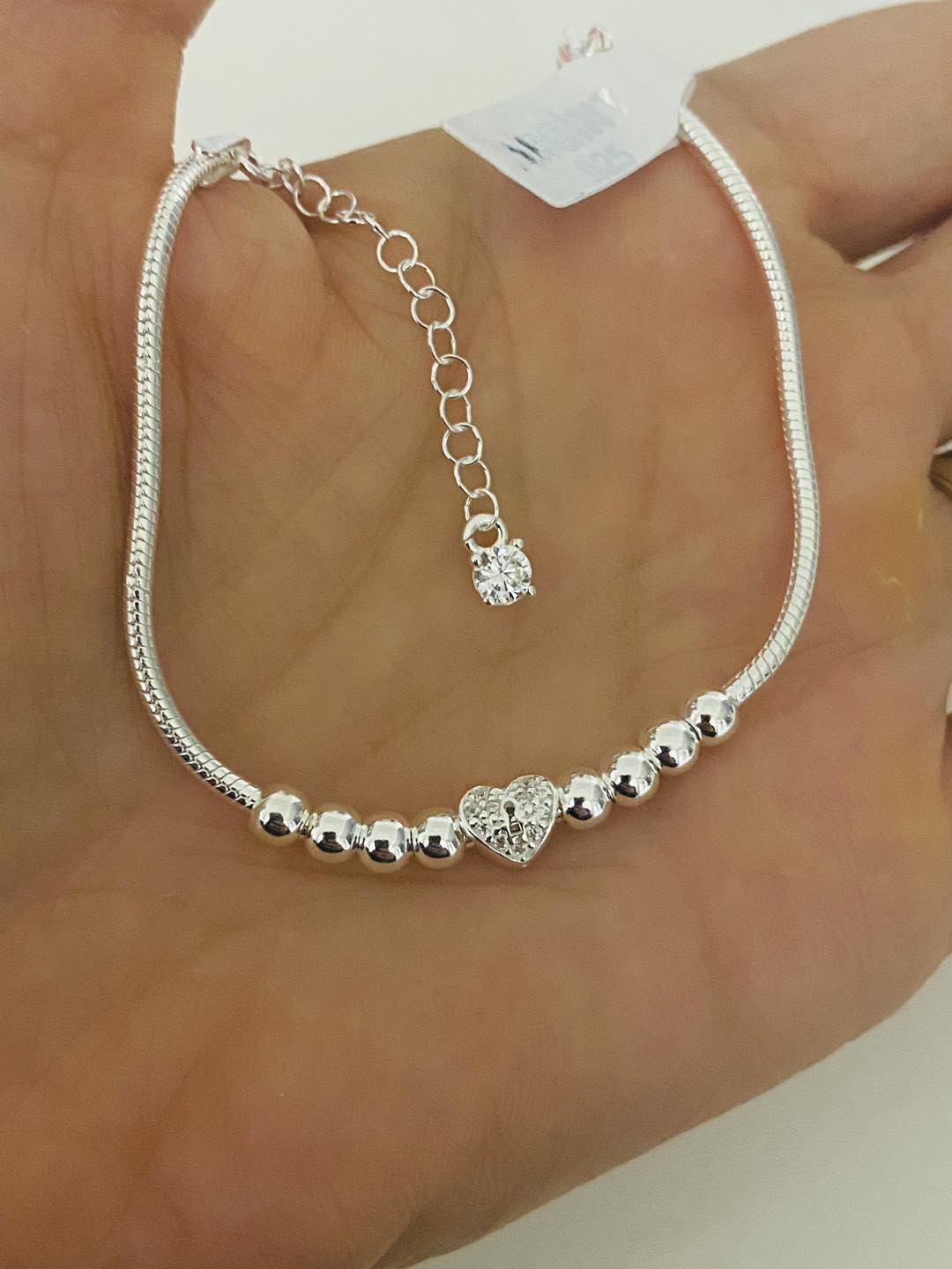 Bratara inima zirconiu argint rodiat pe mana